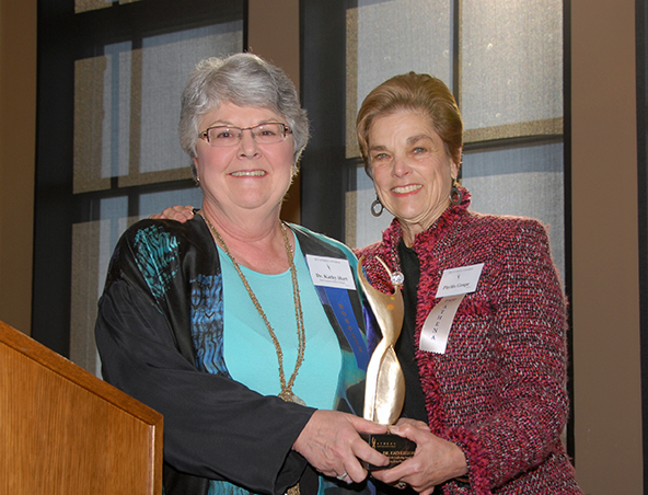San Joaquin Delta College Superintendent/President Kathy Hart accepts the prestigious Athena Award in 2013.