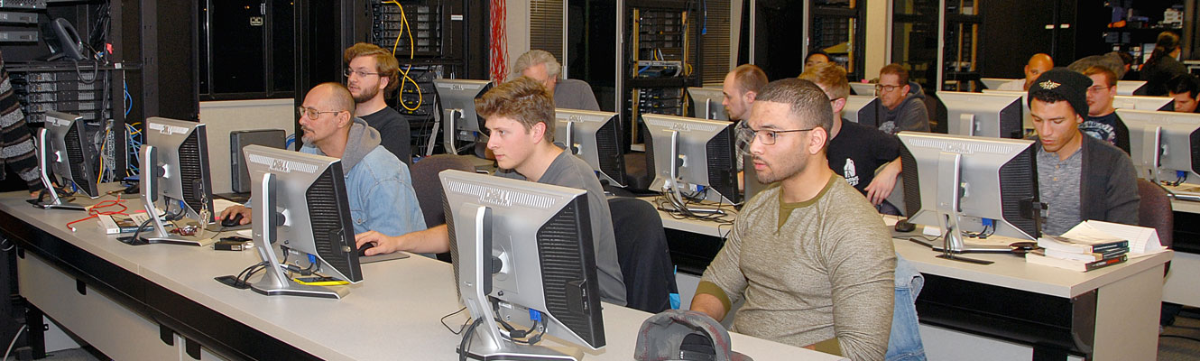 Cisco students work in their lab
