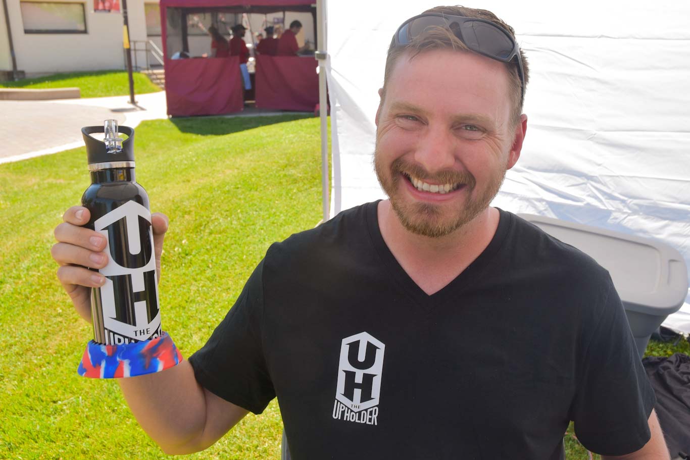 Scott Yoder created "The Upholder," a ring device that stabilizes bottles and cans so they don't spill. Yoder participated in the Student Entrepreneur Expo at San Joaquin Delta College.