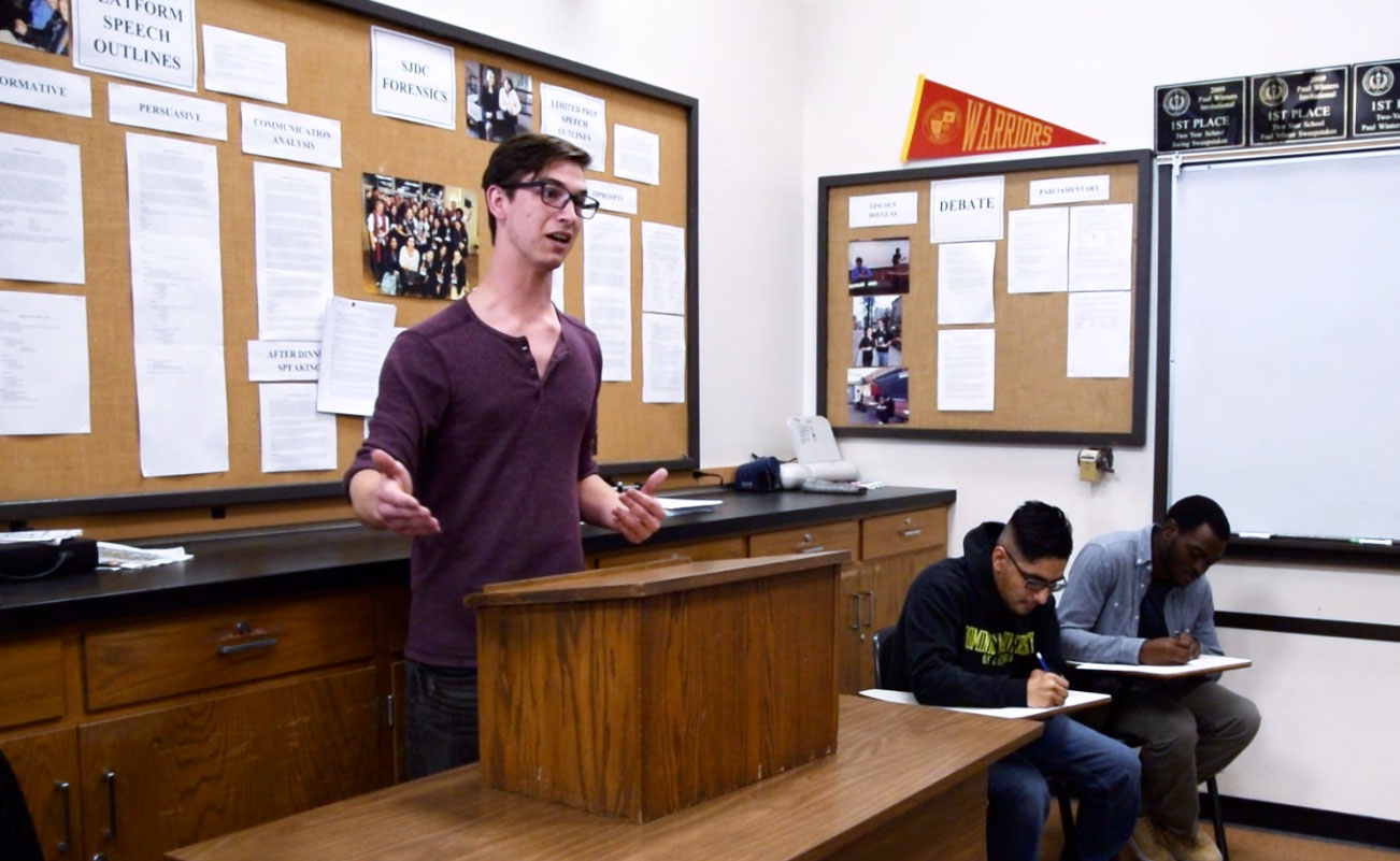 Student delivers speech during speech and debate practice