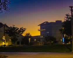 Delta College's DeRicco Building at night