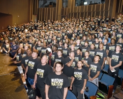 An accreditation team will visit San Joaquin Delta College in March 2020, and the public is invited to submit comments ahead of time. Pictured here, Mustang athletes crowd into the Tillie Lewis Theatre for a photo shoot.
