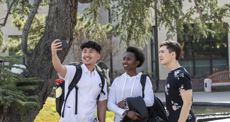 Students take a selfie on the Delta College campus