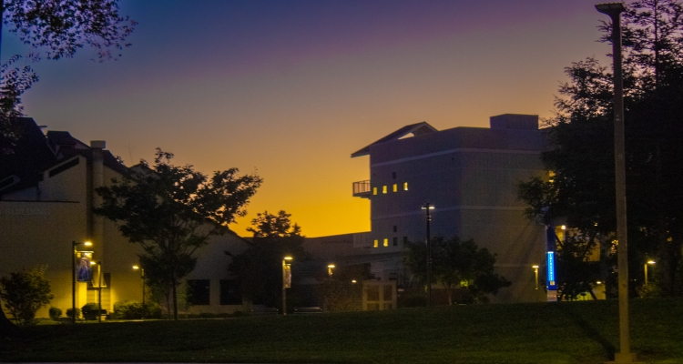 Delta College's DeRicco Building at night