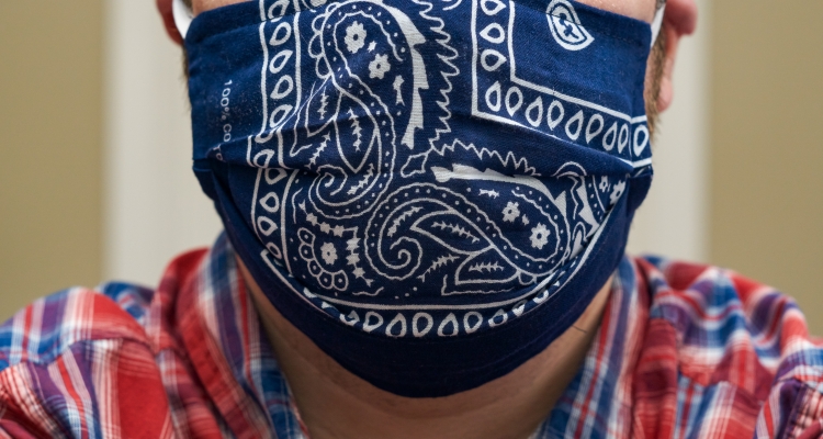 Person wearing cloth face covering
