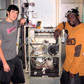 Students work during heating and air class