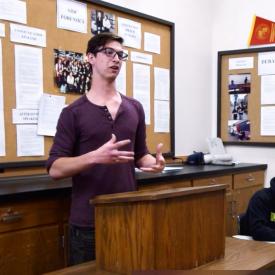 Student delivers speech in forensics class